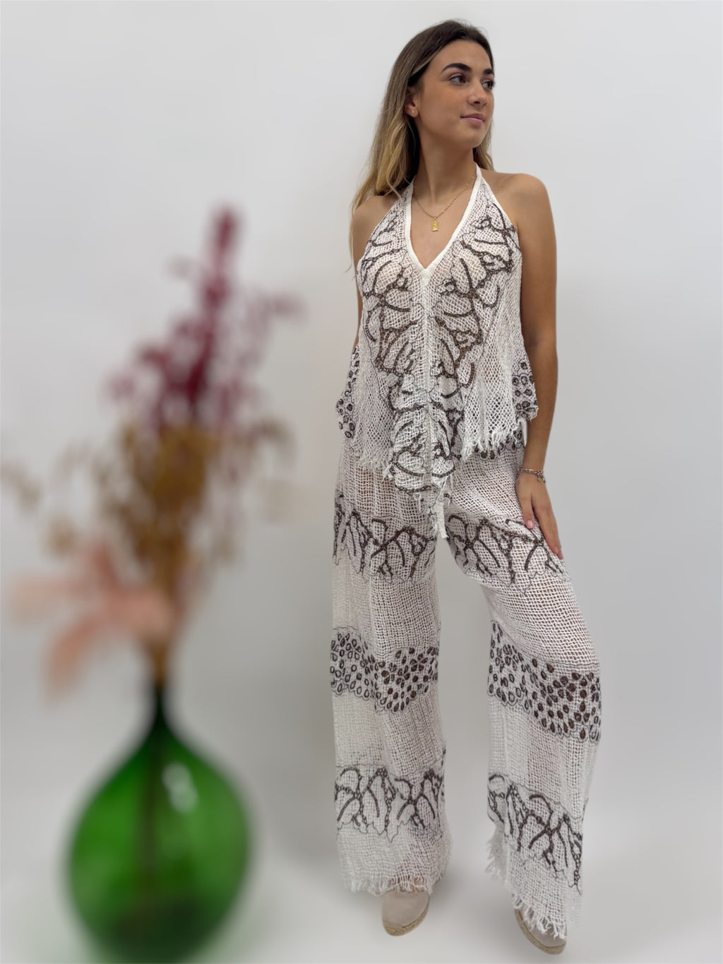 Set of trousers and top in Raw embroidered linen net